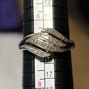Sterling silver and pave diamond ring.